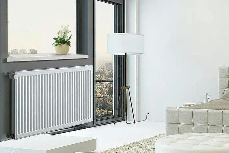 空气能热泵，末端选暖气片还是地暖？